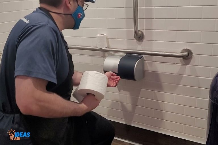 how to change cintas paper towel dispenser