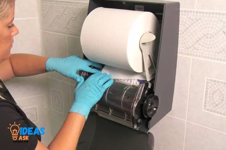 How to Put a Paper Towel Dispenser on a Wall 1